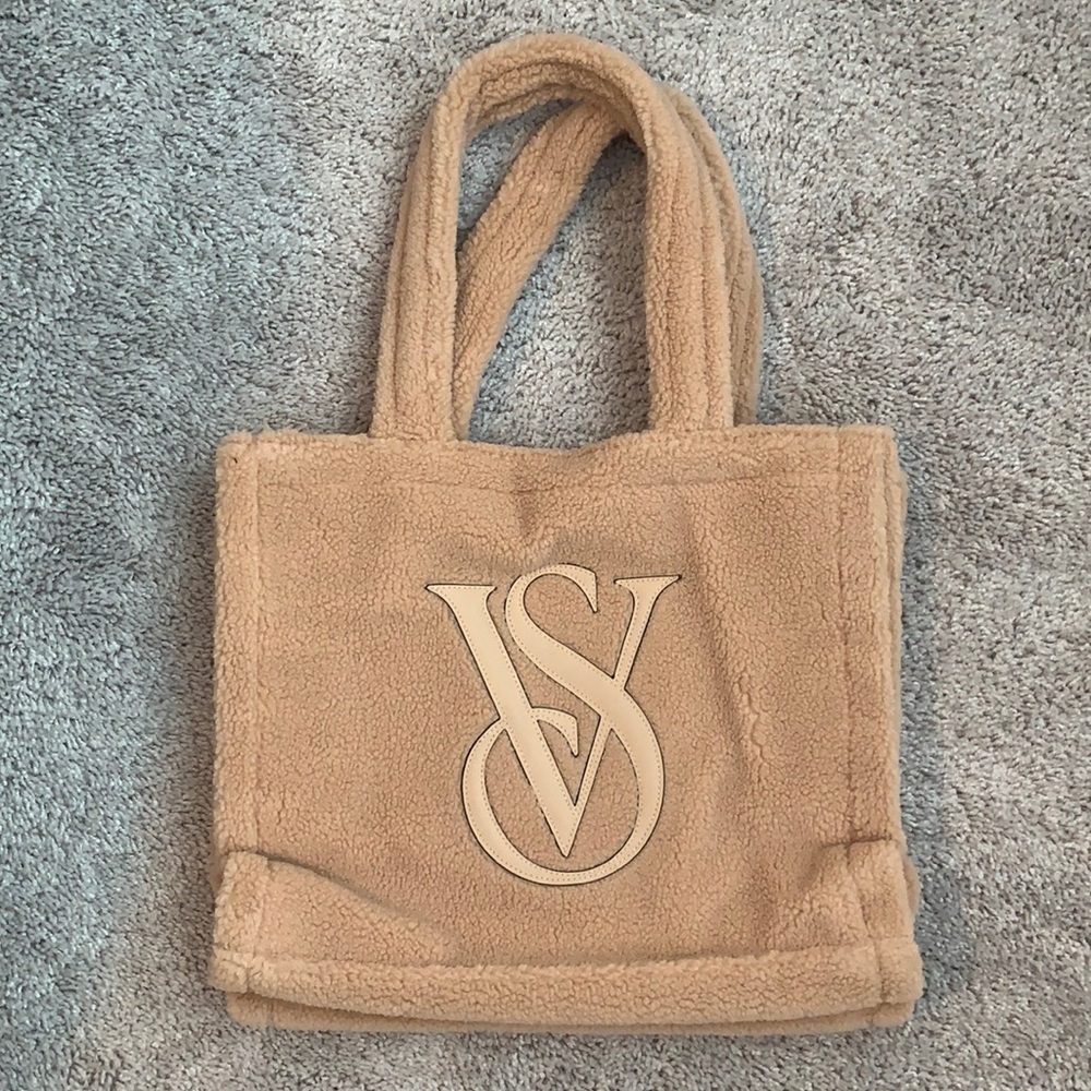 Fuzzy victoria secret bag, tan color, large inside, never been used
